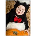 Baby in Skunk Costume with Pumpkins Greeting Card for Halloween and Autumn Celebration