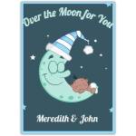 Over The Moon New Baby Card with Sleeping Baby and Moon in Blue and White Hat