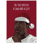 Humorous Christmas Card with Man in Santa Hat and Funny Gift Expectation Quote