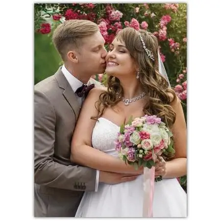 Romantic Wedding Day Greeting Card Featuring Bride and Groom Embracing Outdoors