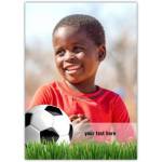 Personalised Kids Football Card with Smiling Boy in Red Shirt and Green Grass Background